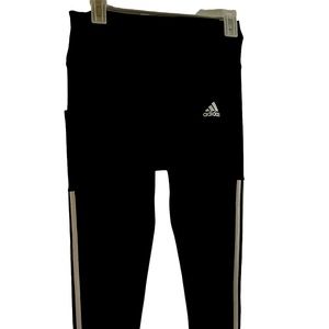 Adidas Black yoga pants. Phone pocket on the right side. Ankle length.